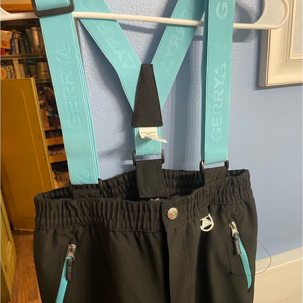 Gerry snow pants.  Youth Size 14/16.  Black with light blue accent.